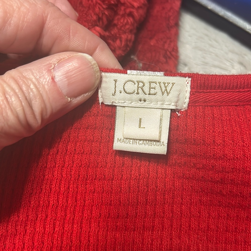 Thermal top with gold buttons .